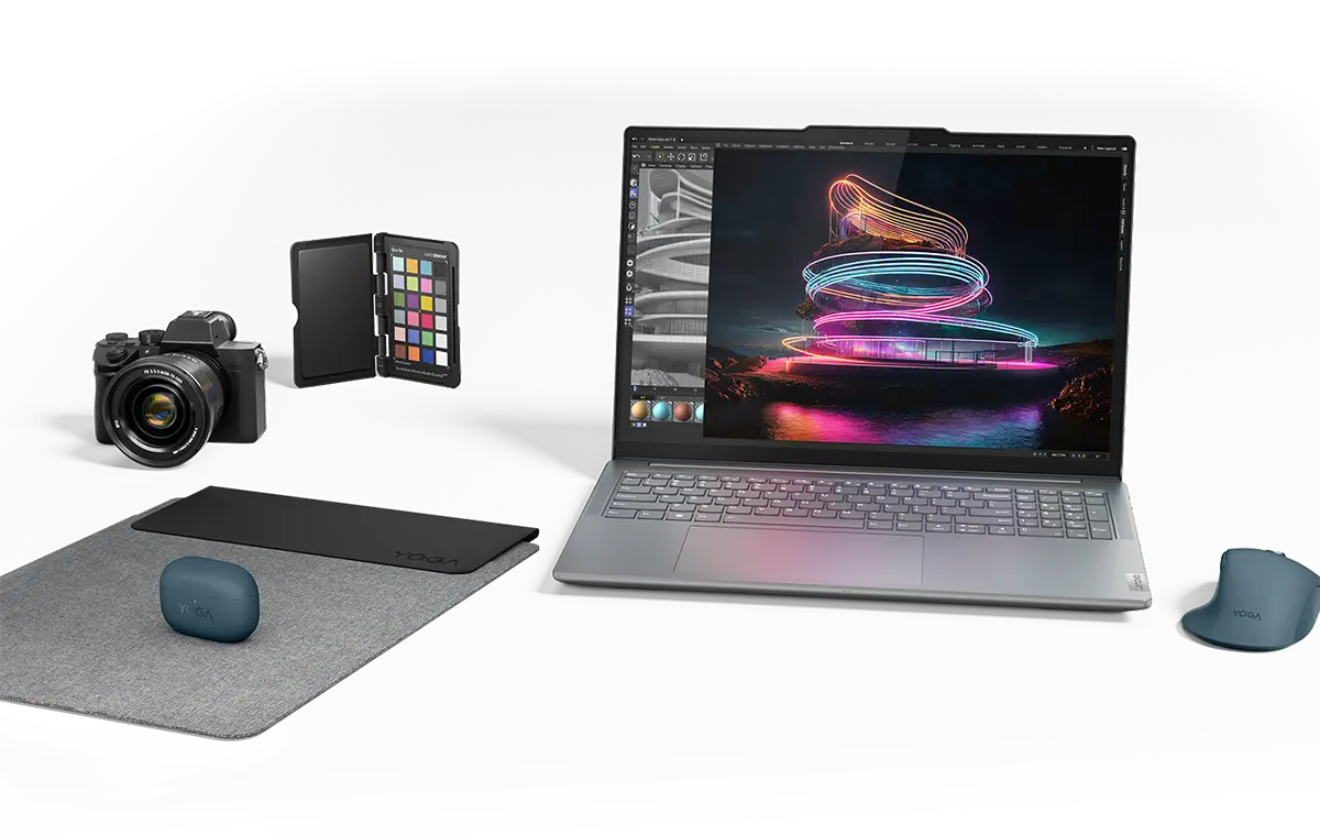 Un portátil Lenovo Yoga con una variedad de accesorios y dispositivos